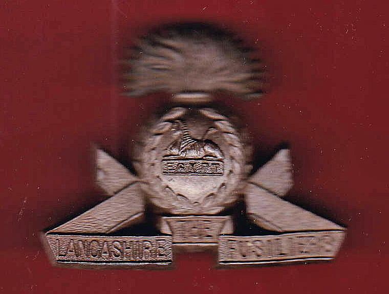 The Lancashire Fusiliers WW2 plastic economy cap badge