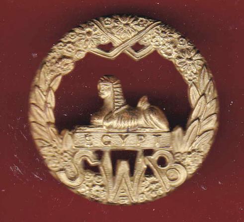 South Wales Borderers WW1 brass economy cap badge