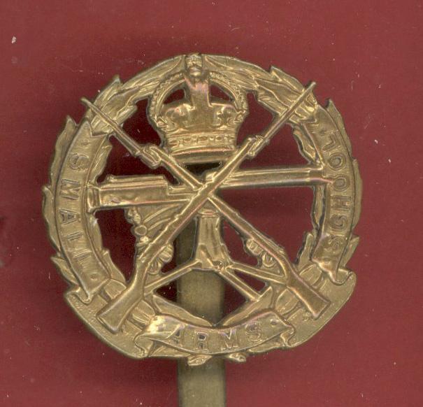 Small Arms School King's crown cap badge