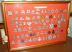 Collection of 83 WW2 Infantry plastic economy badges