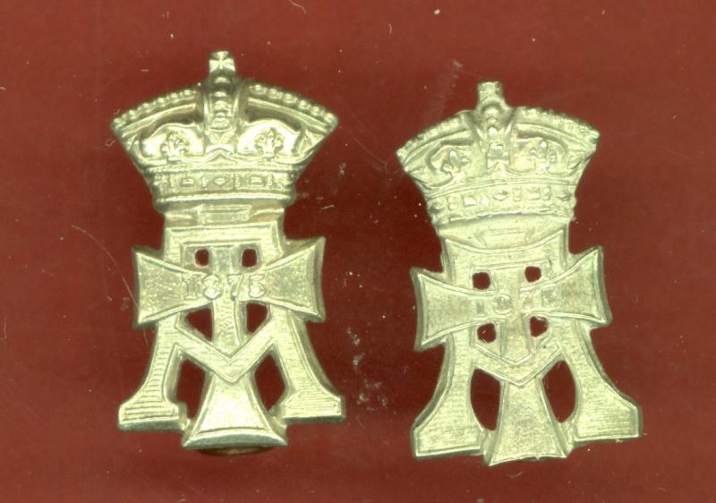 The Green Howards OR's collar badges
