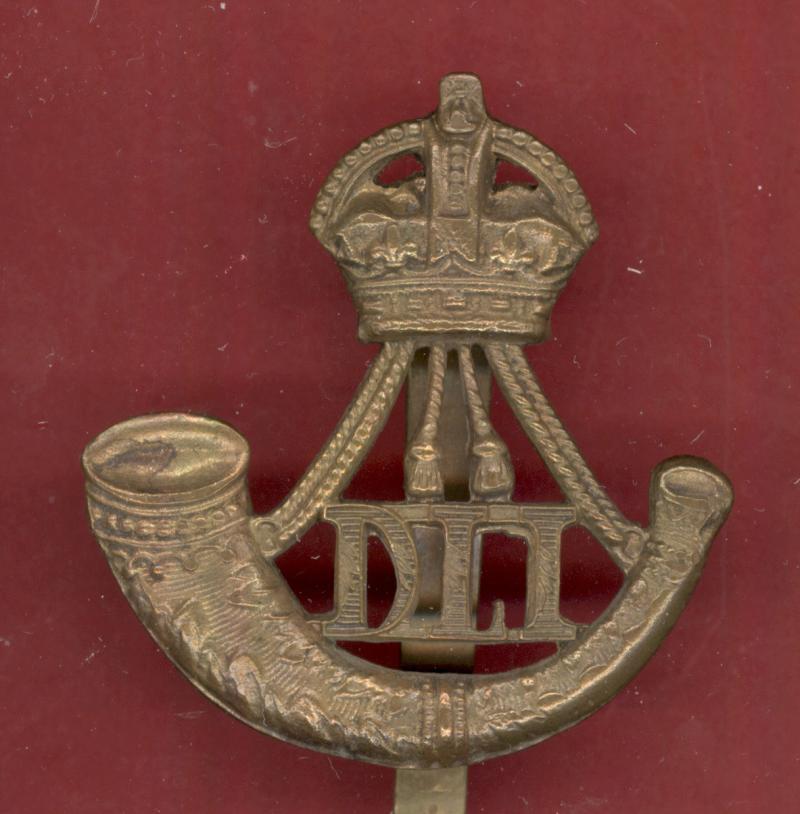 Durham Light Infantry WW1 brass economy cap badge